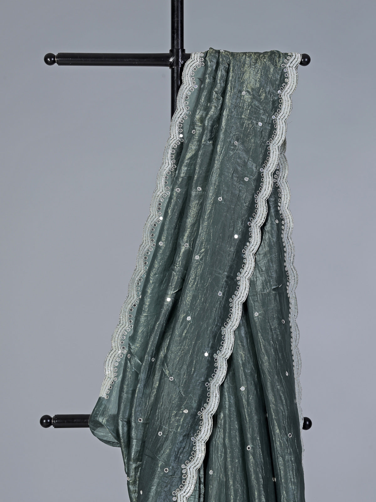 Rama green tissue silk saree with elegant embellishments