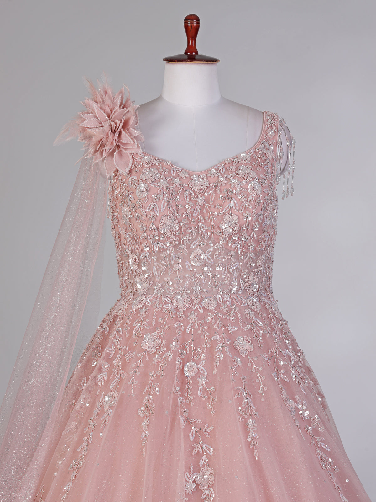 Pink net designer gown with sequins and beads work