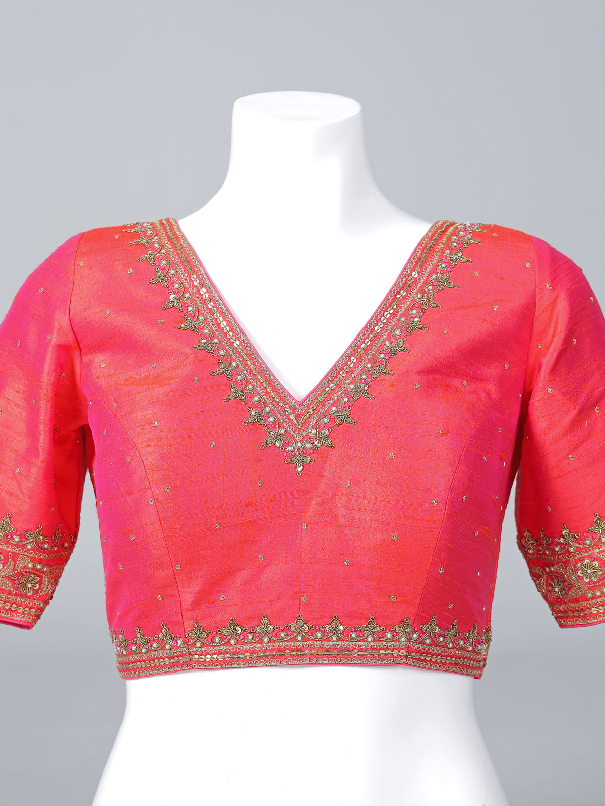 Orange raw silk zardosi embellished V neck blouse