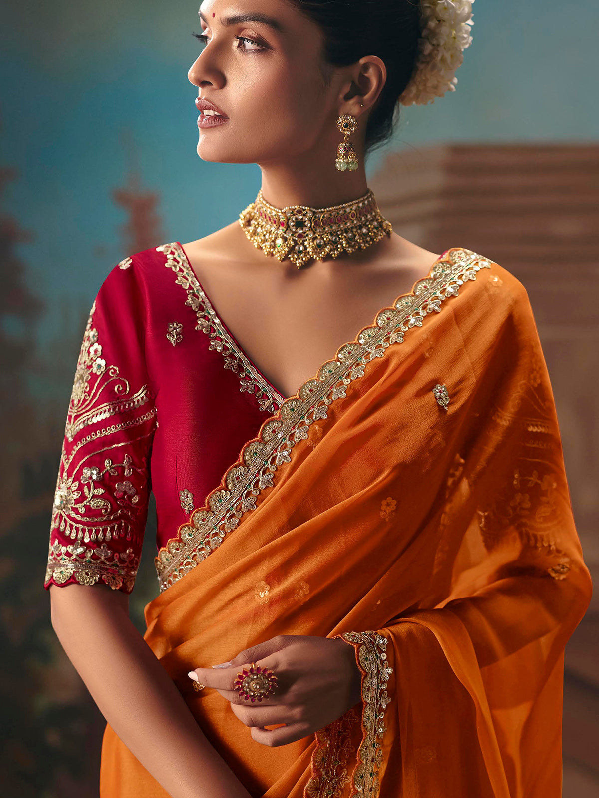 Orange fancy tissue silk embellished saree