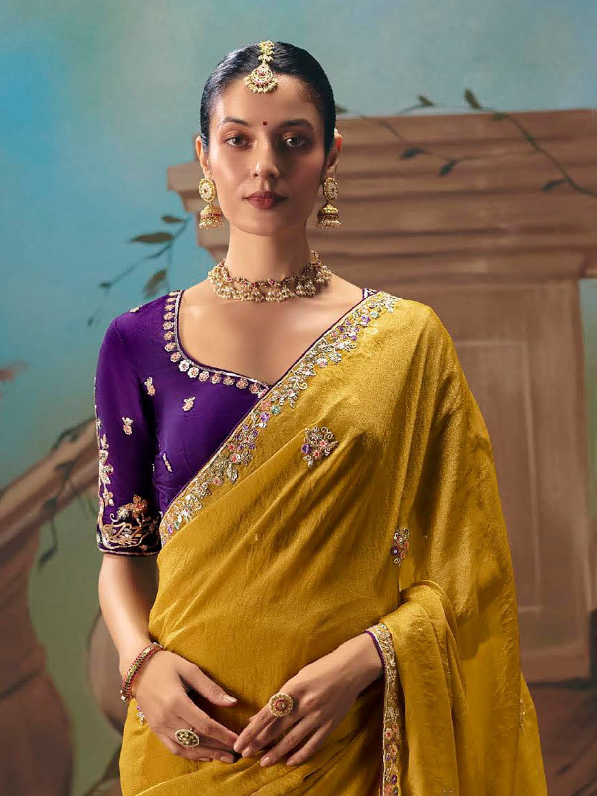 Mustard yellow silk embellished saree