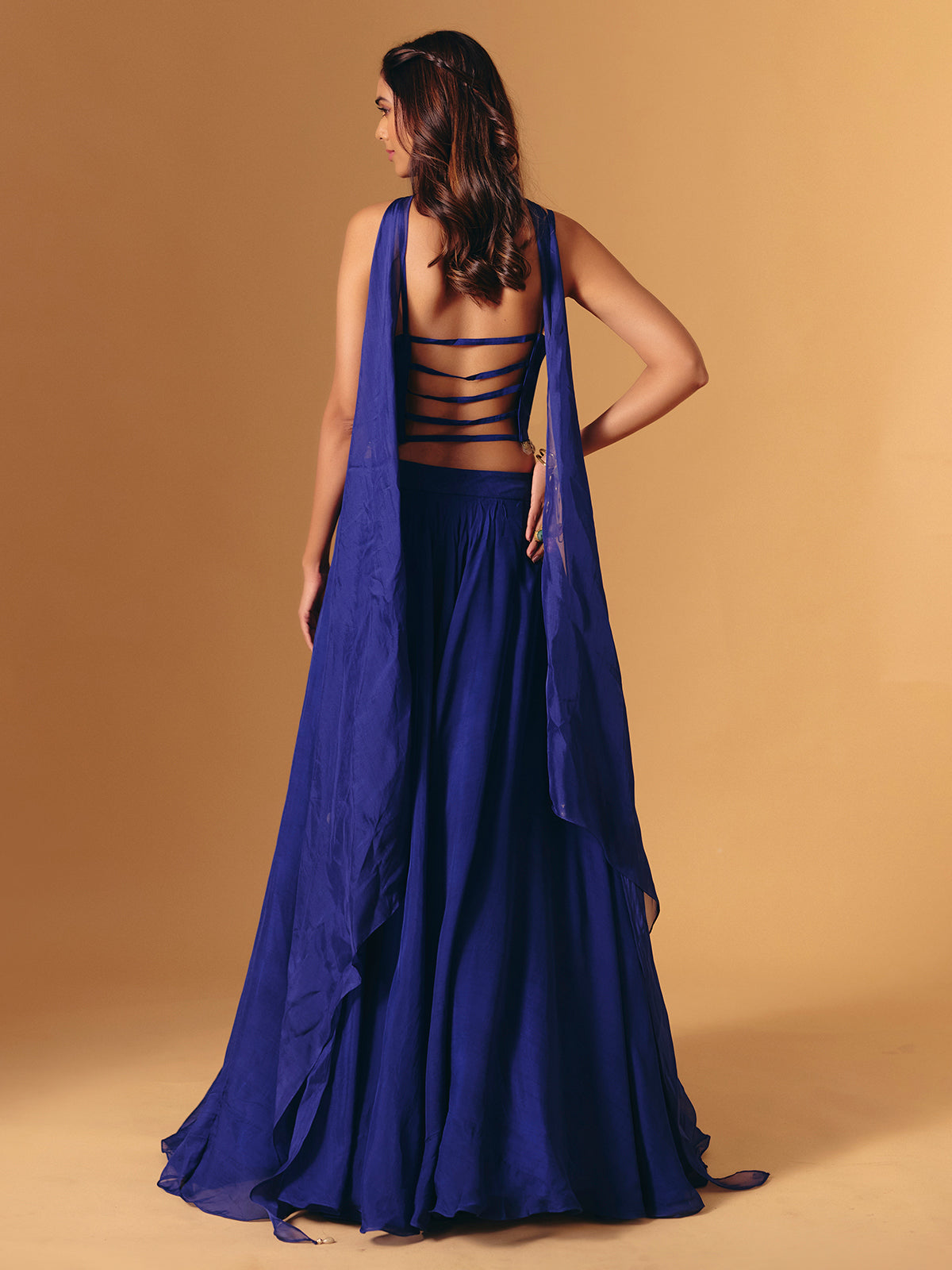 Blue georgette lehenga choli with cowrie shell