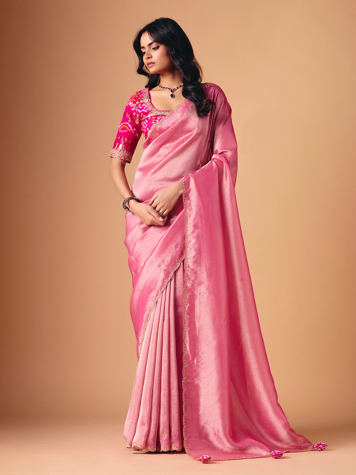 Pink tissue silk designer saree for reception