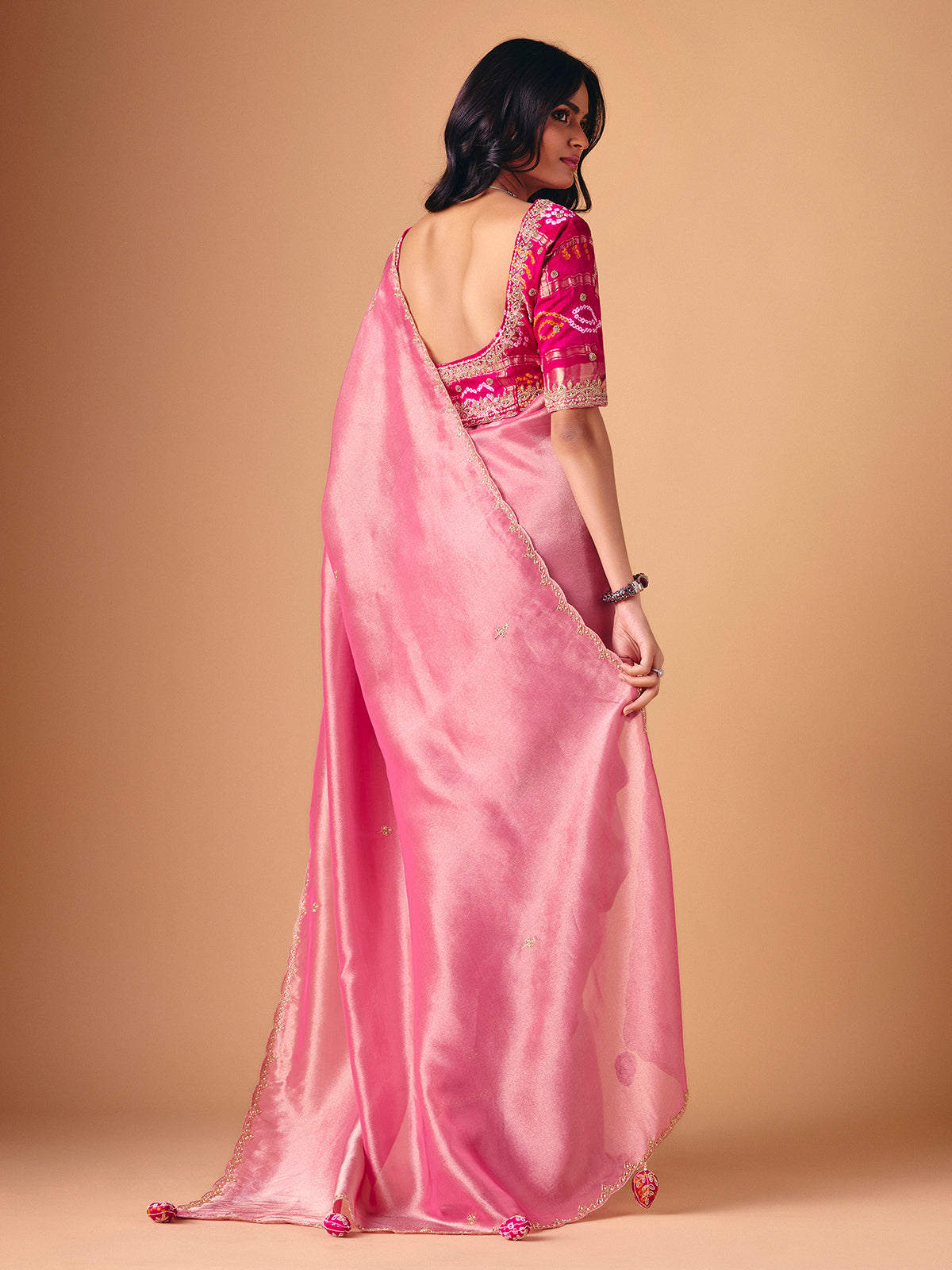 Pink tissue silk designer saree for reception