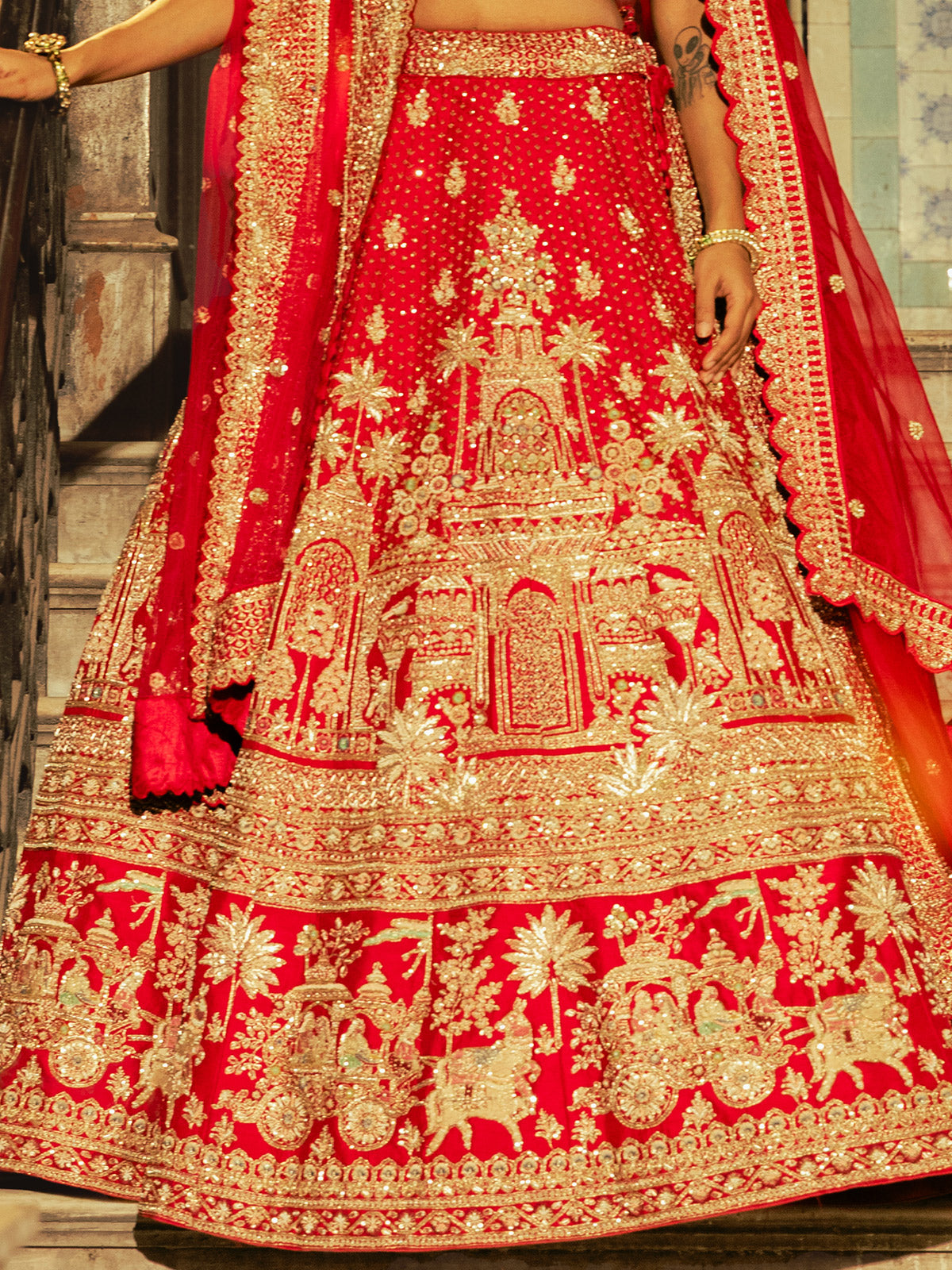 Red raw silk lehenga choli with ornate detailing
