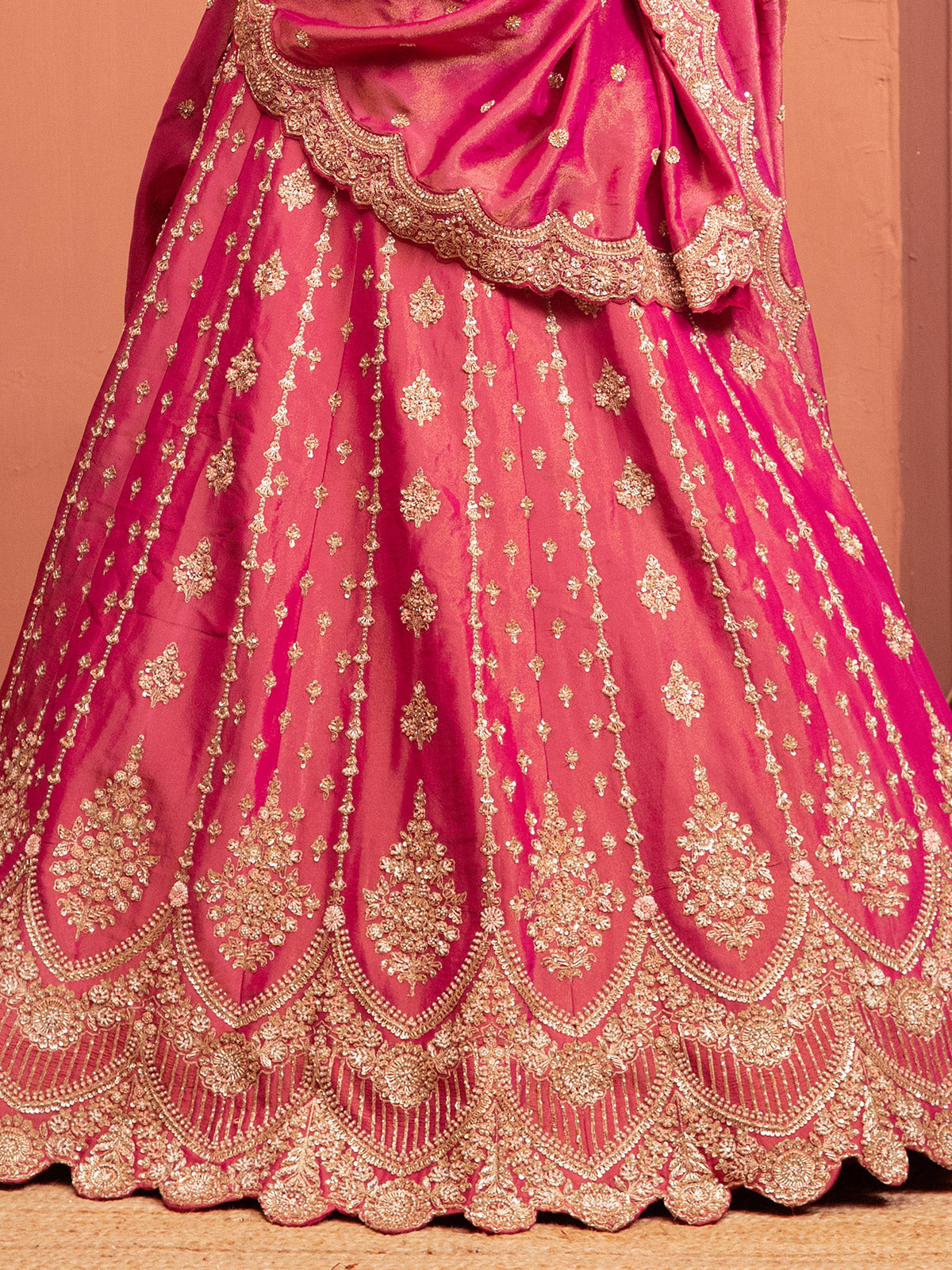 Pink raw silk lehenga choli with embellishments