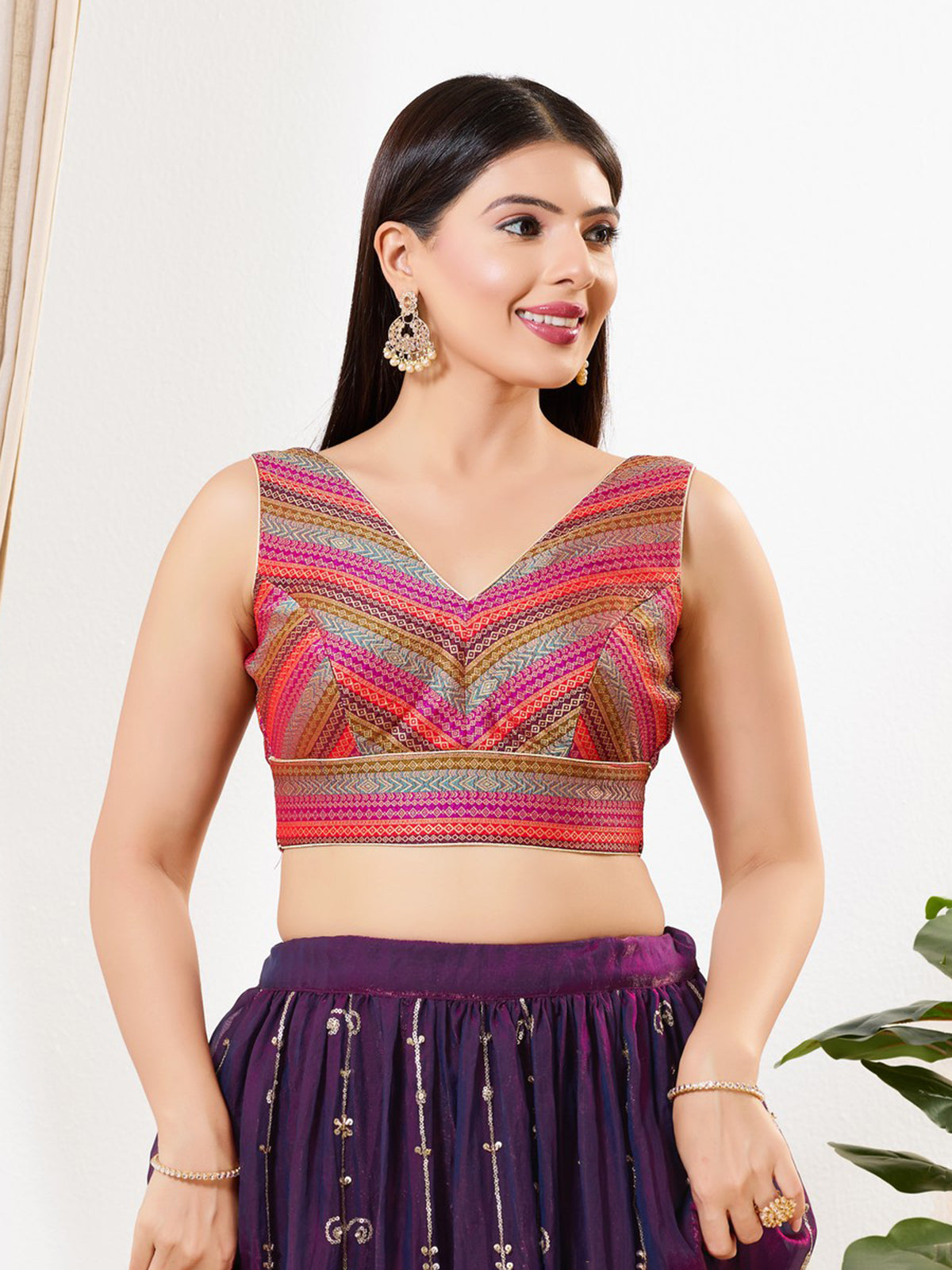 Magenta multi printed zari brocade sleeveless blouse