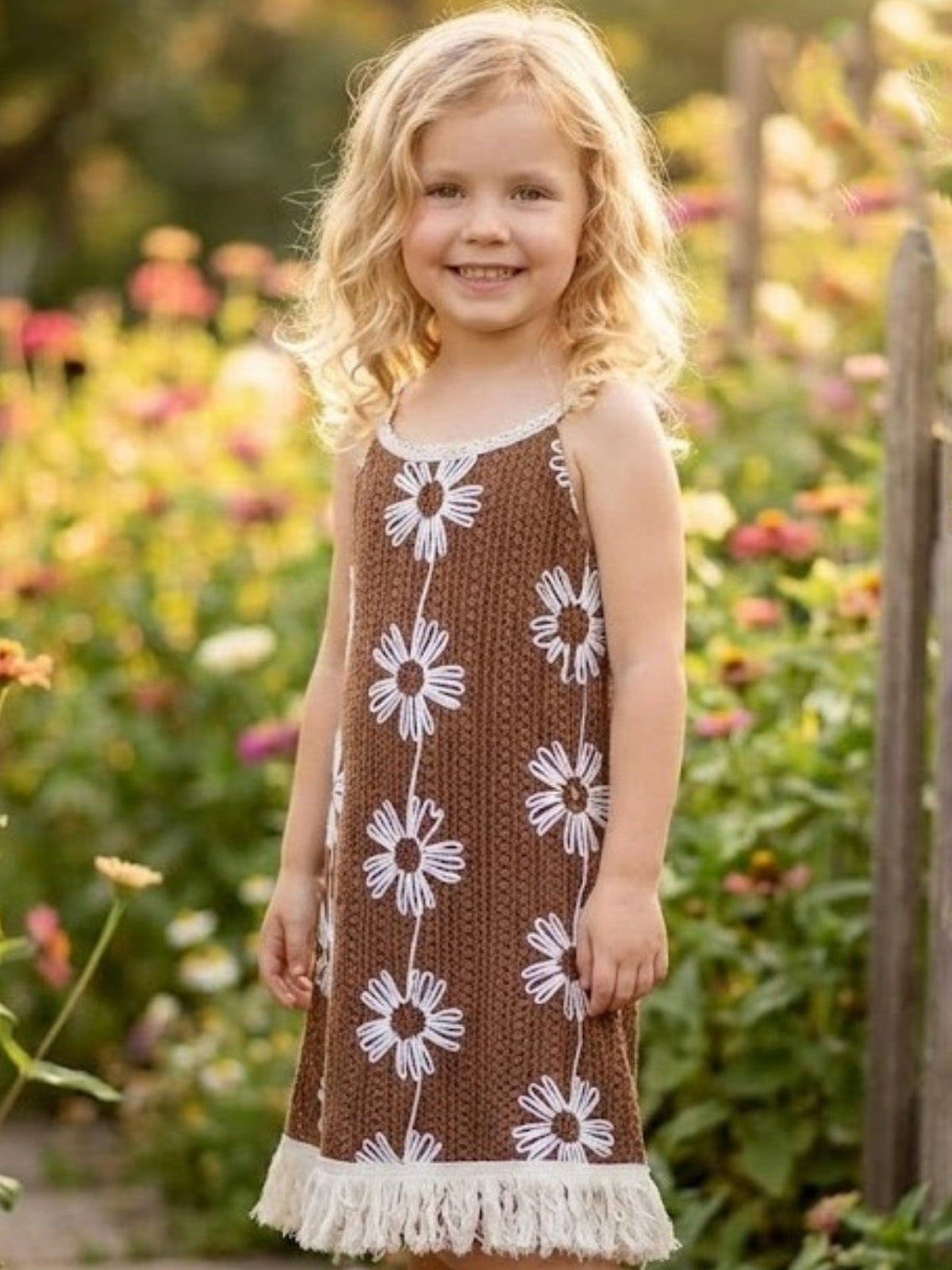Brown knitted girls frock with thread embellishment