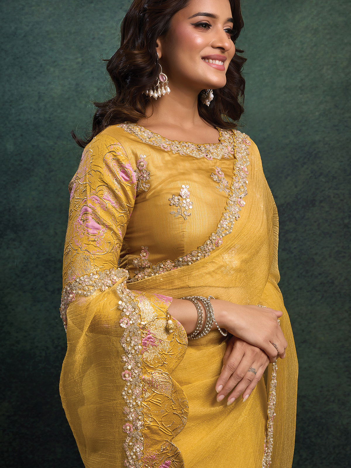 Mustard yellow embellished organza silk saree