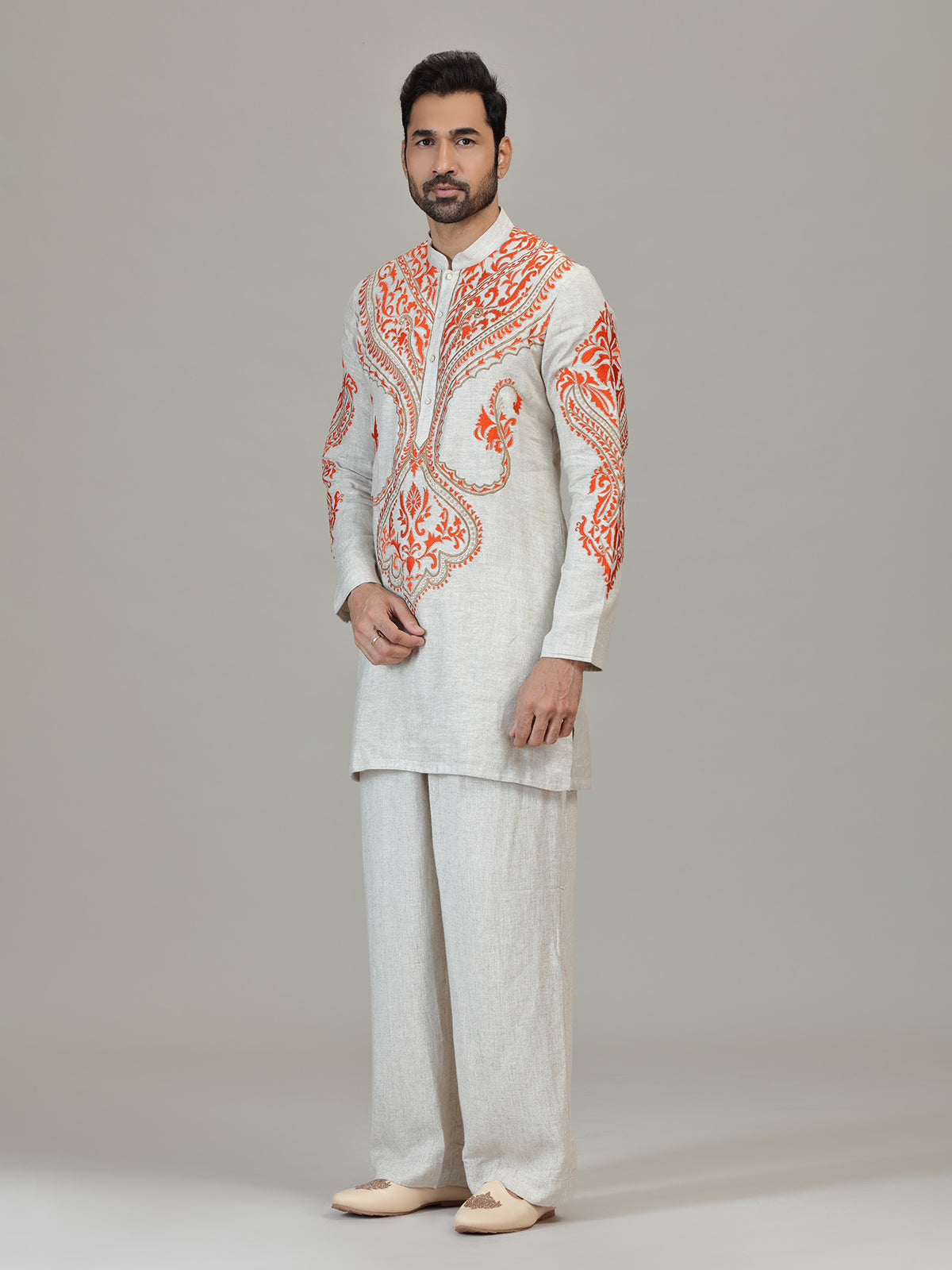 Ivory orange embroidered contemporary celebration look