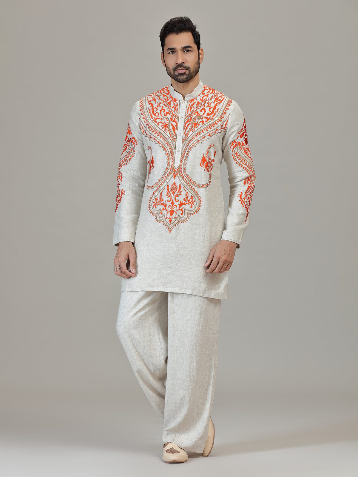 Ivory orange embroidered contemporary celebration look