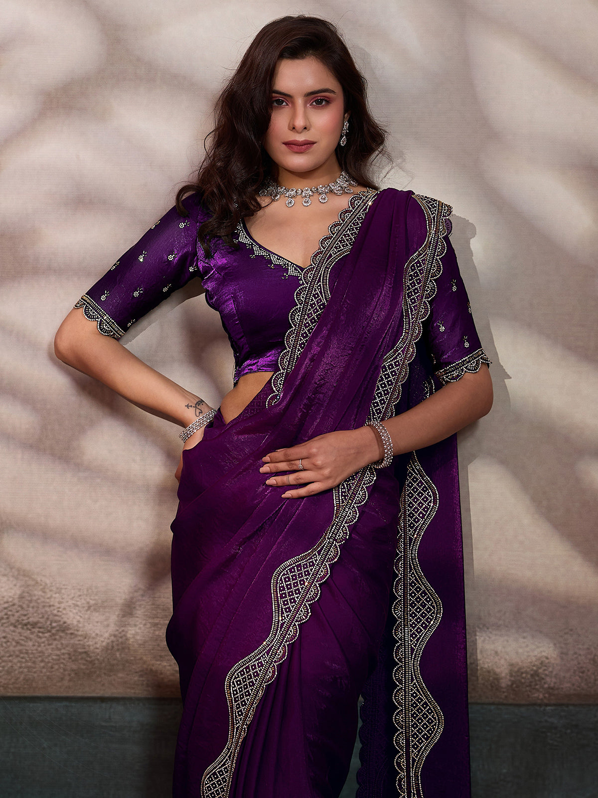 Purple stone worked satin silk saree for party wear