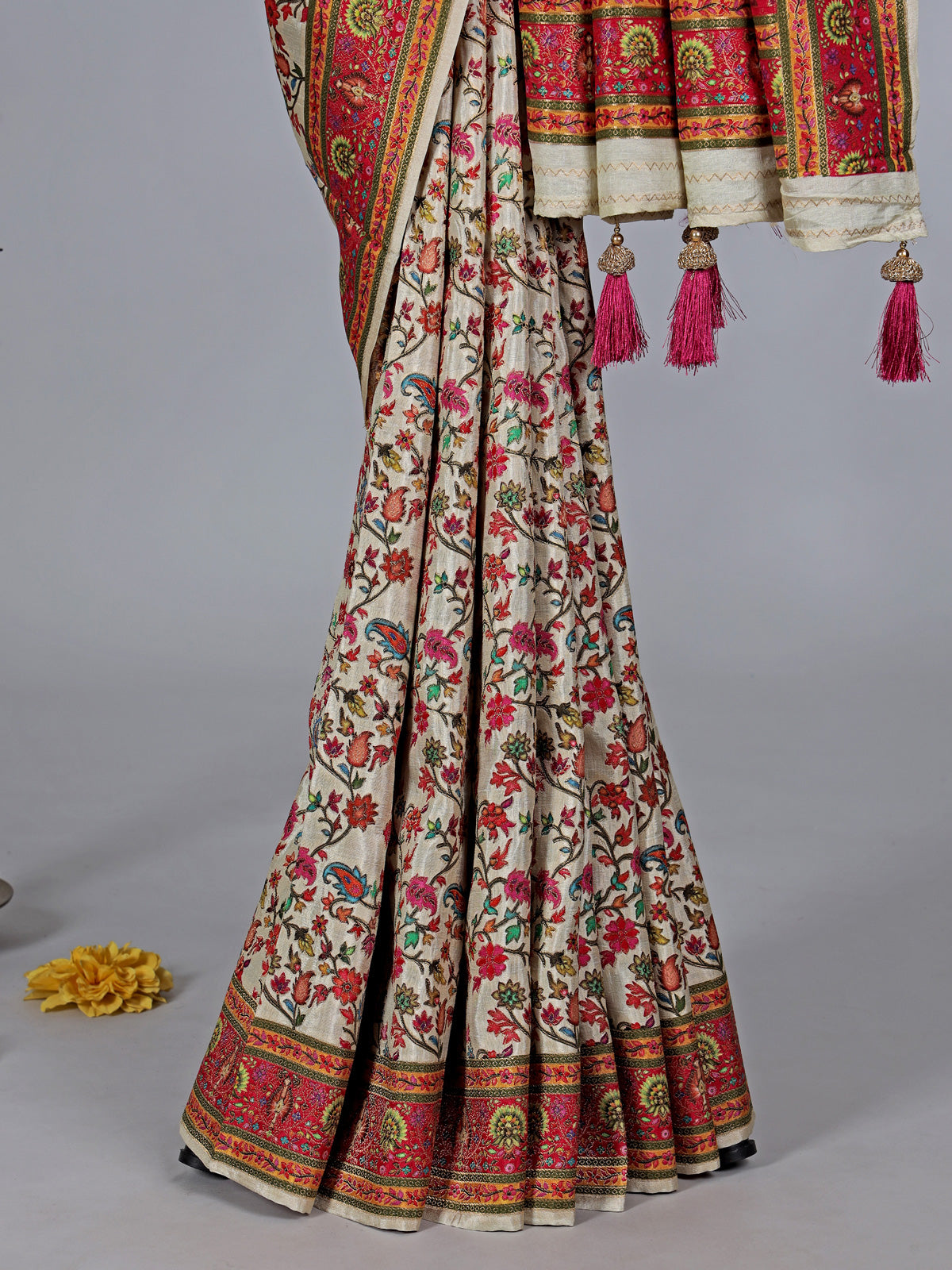 Cream semi pashmina silk saree with motfs weaving