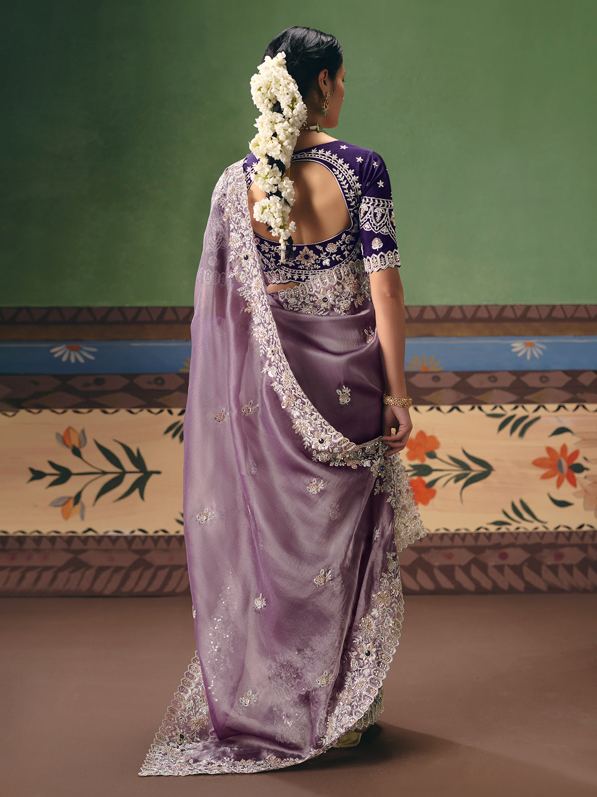 Light purple fancy silk wedding saree with statement blouse