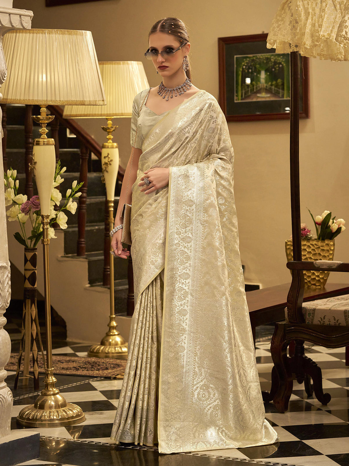 Cream satin silk saree with elegant zari work