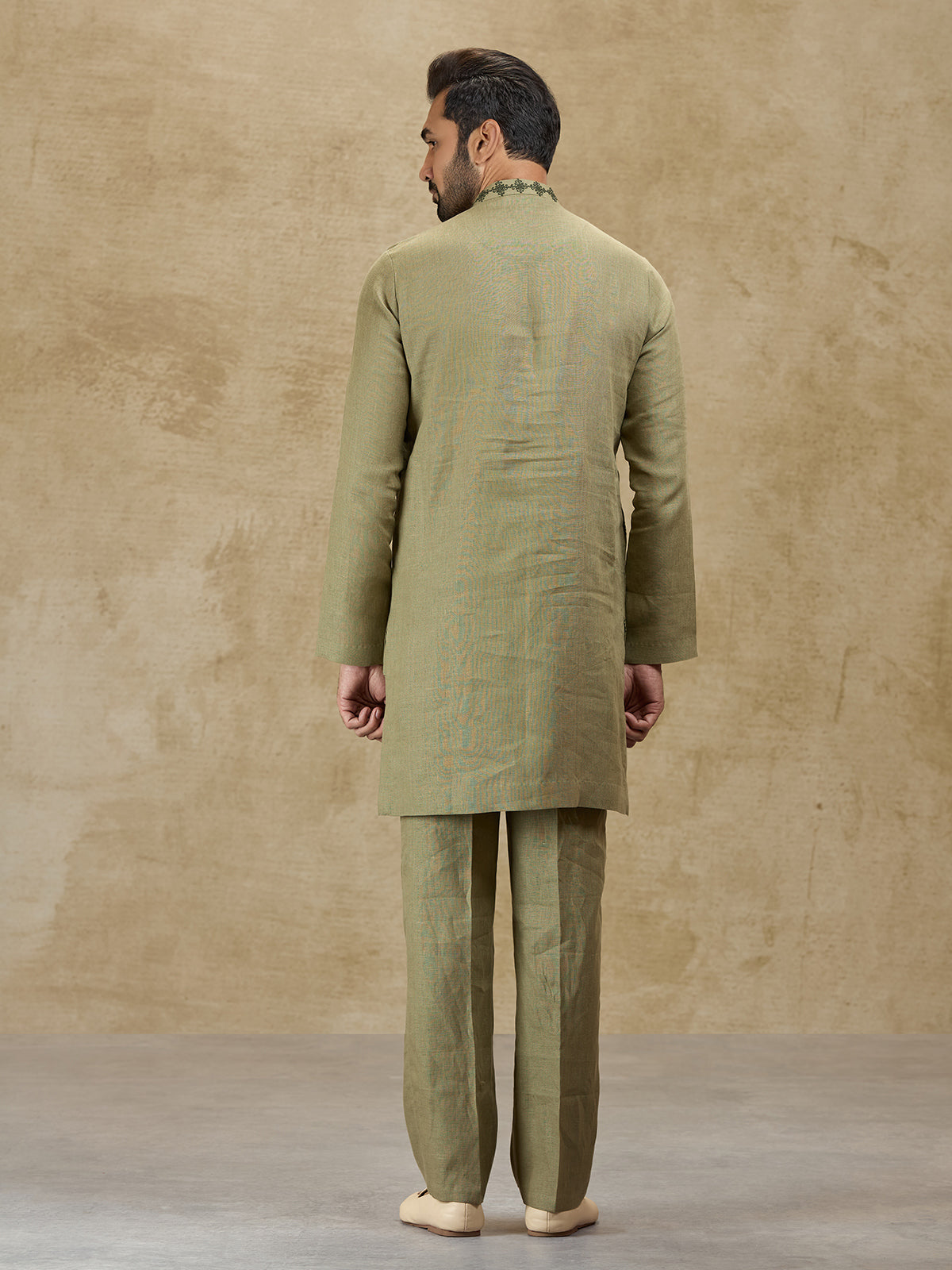Olive green linen kurta suit for wedding celebrations