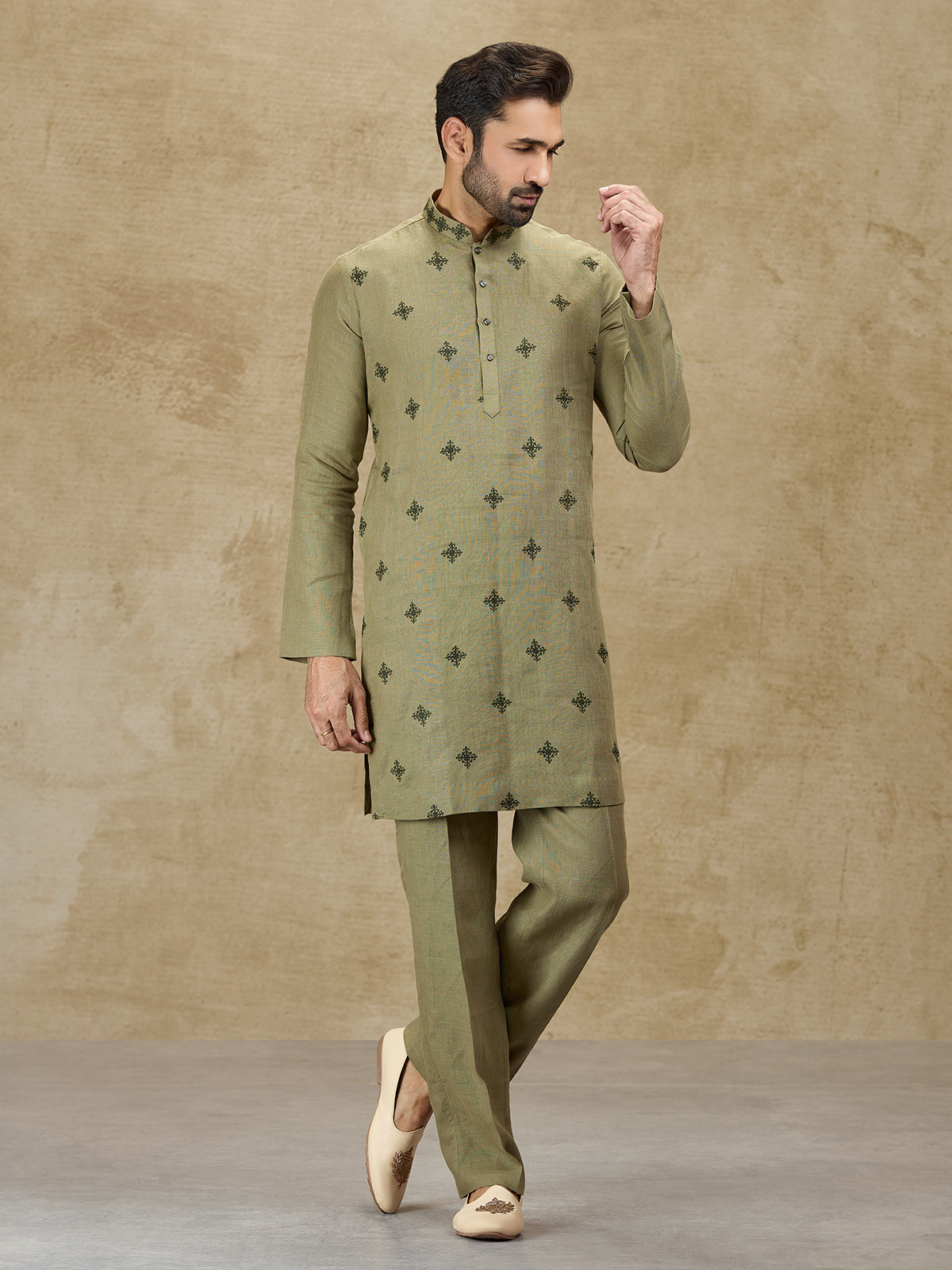Olive green linen kurta suit for wedding celebrations