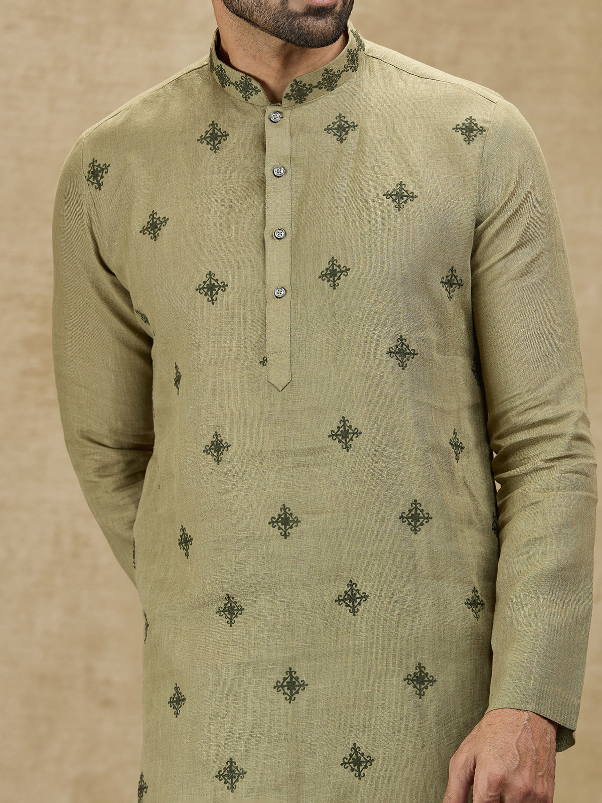 Olive green linen kurta for wedding celebrations