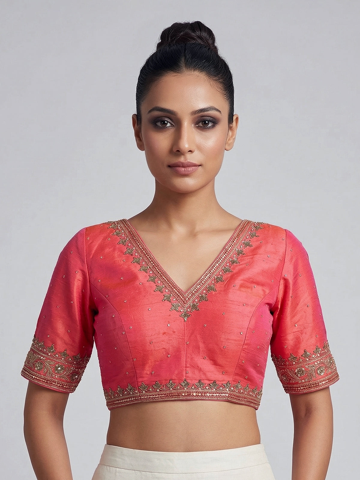 Orange raw silk zardosi embellished V neck blouse