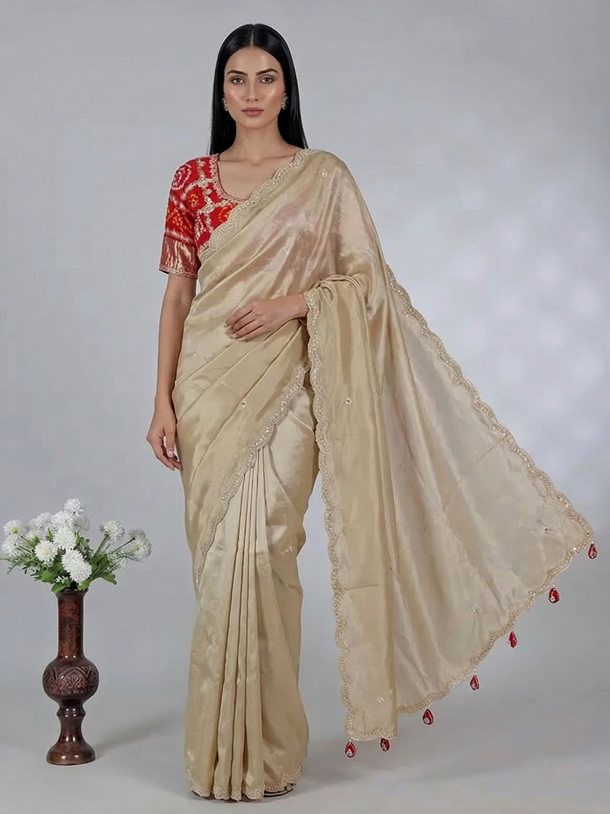 Beige tissue silk heavy embellished saree