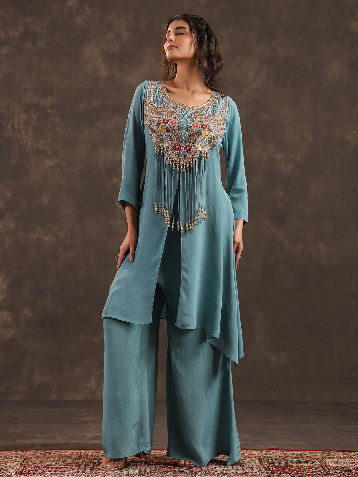 Sky blue yoke style palazzo suit with delicate embellishments