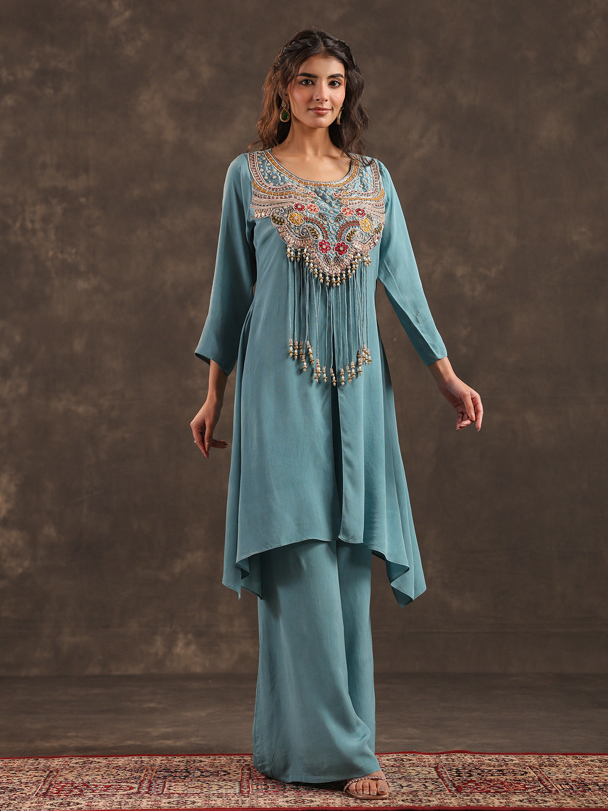 Sky blue yoke style palazzo suit with delicate embellishments