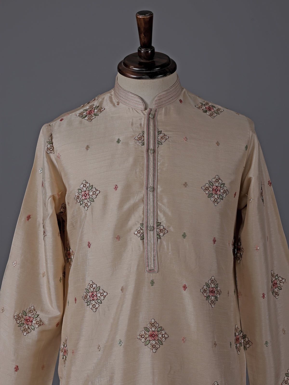 Cream silk embroidered kurta suit with festive sequin detailing
