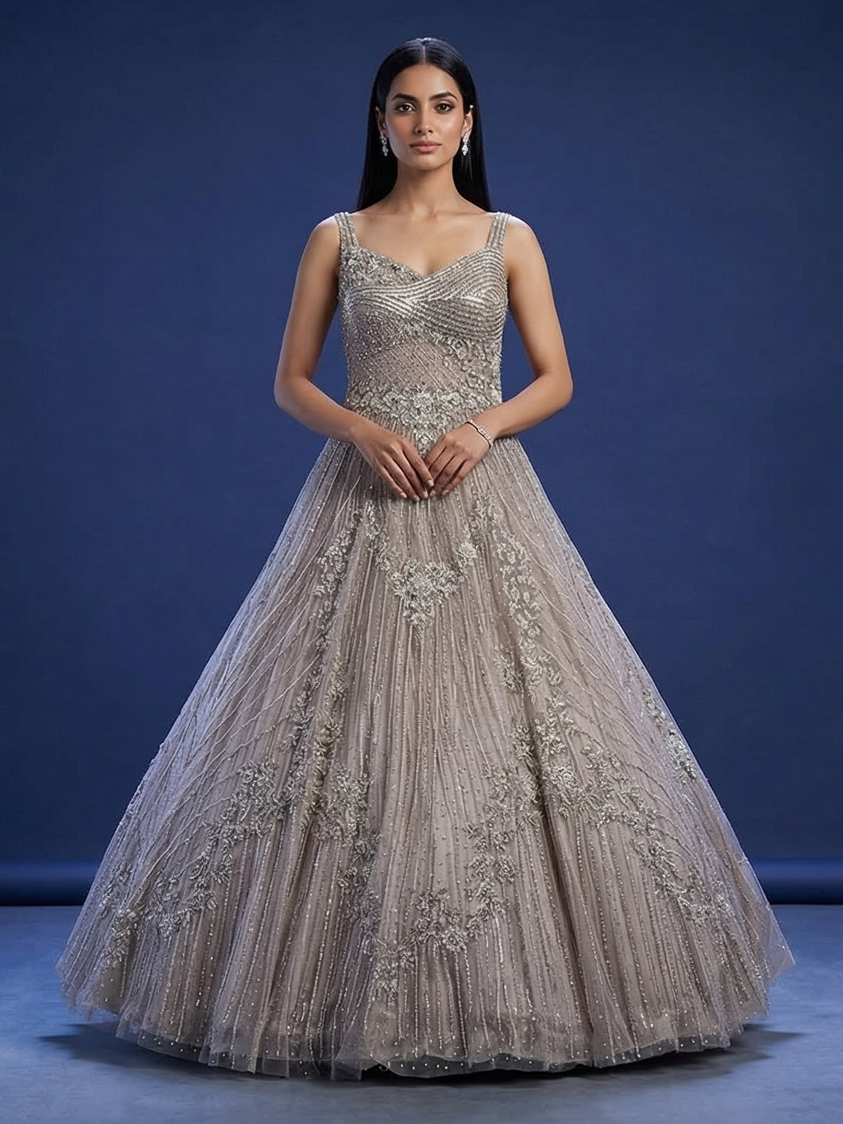 Beige net sleeveless sweetheart designer floor length gown