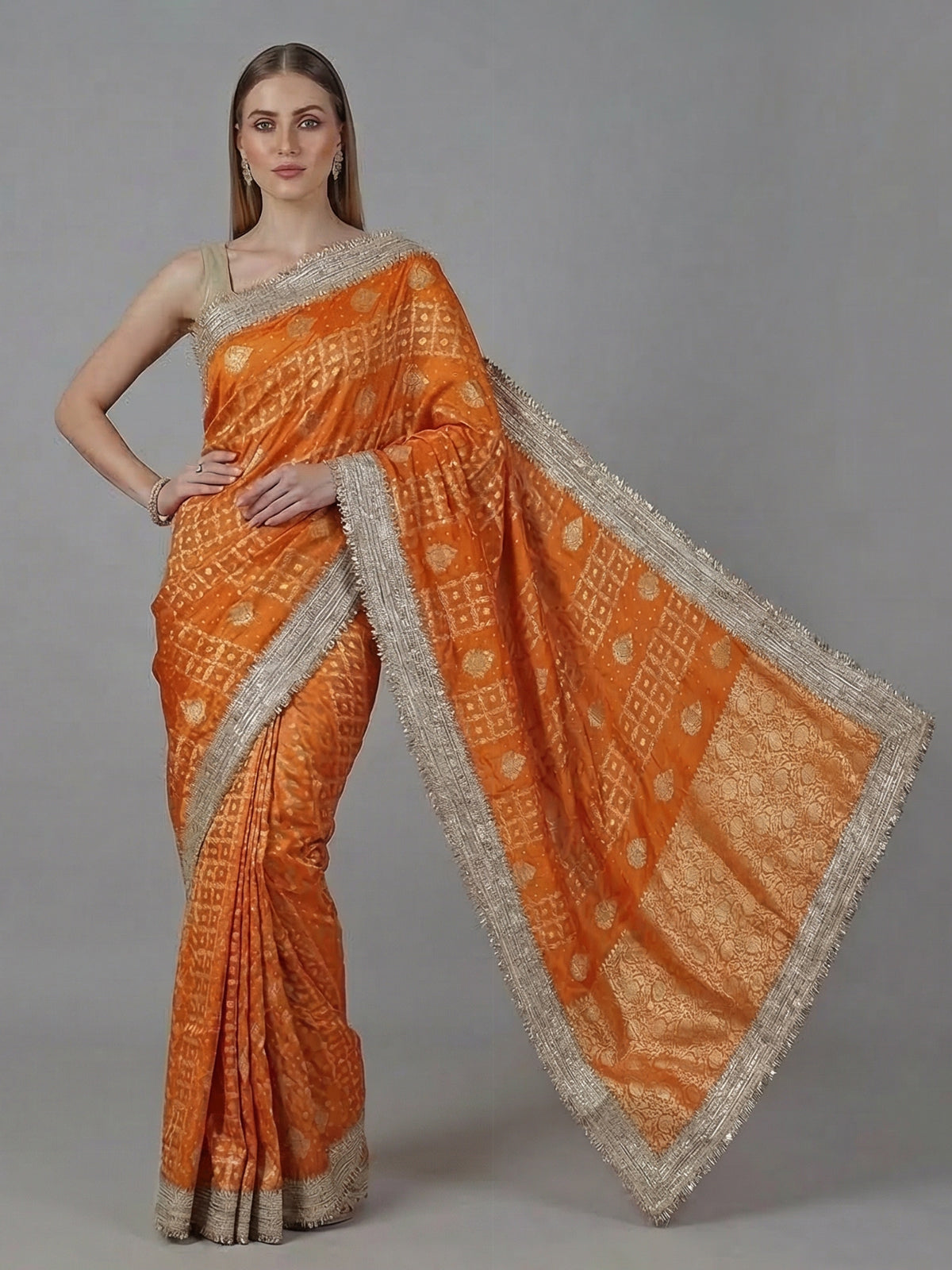 Rust orange dola silk zardosi detailed festive saree