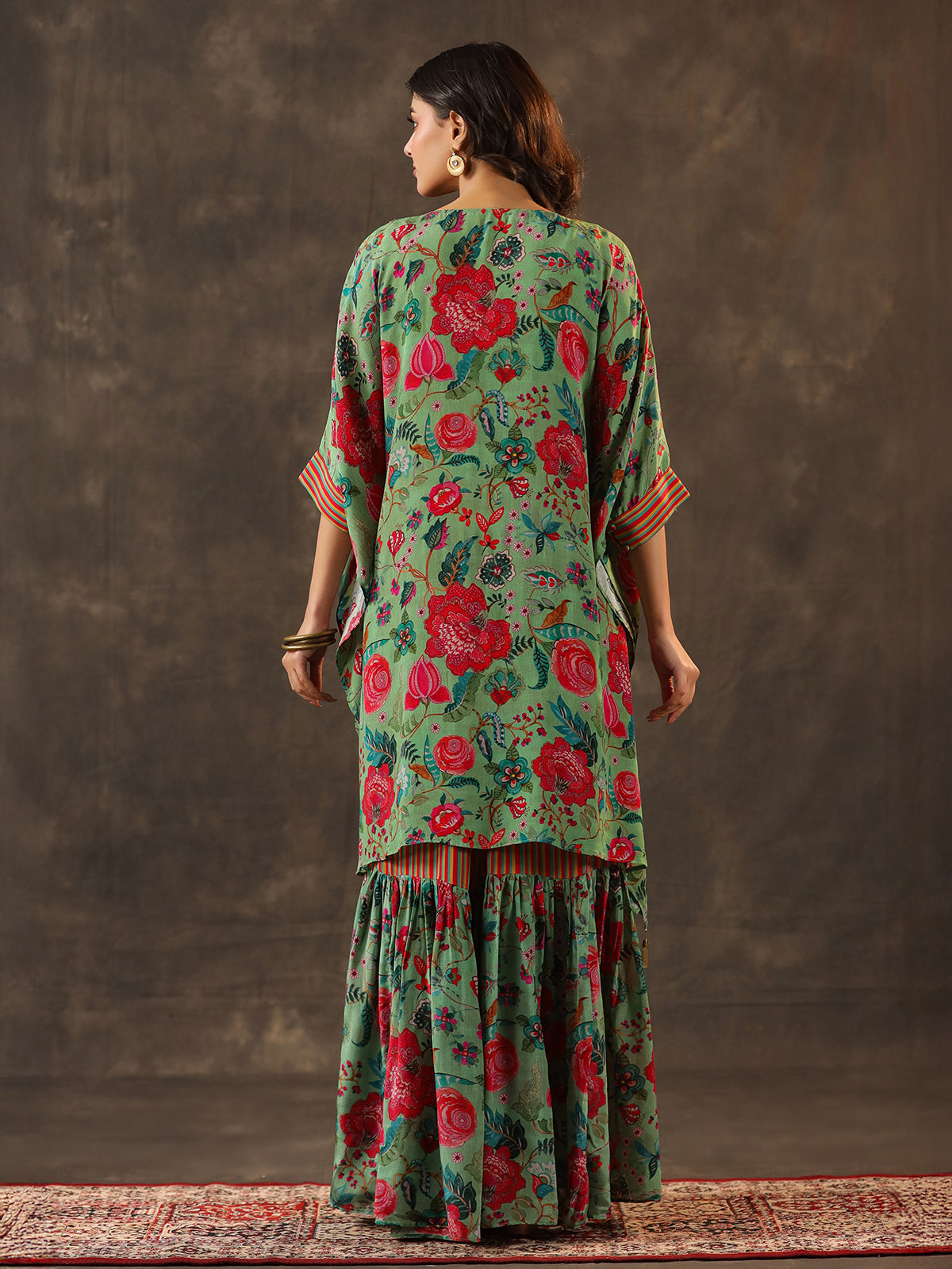 Pista green silk kaftan style designer sharara suit
