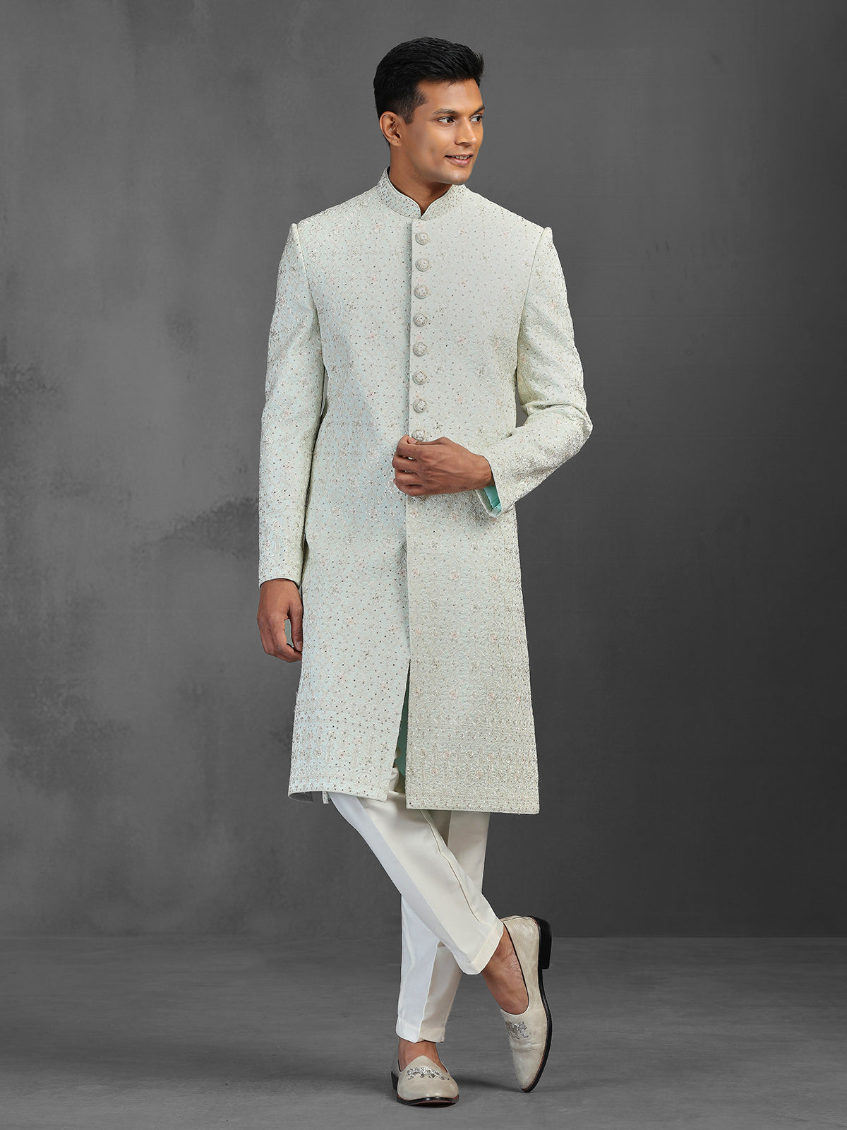 Light pista silk sherwani with thread and stone detailing