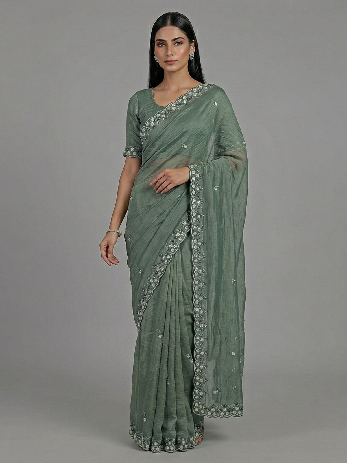 Mehendi green chiffon zardosi embellished festive saree