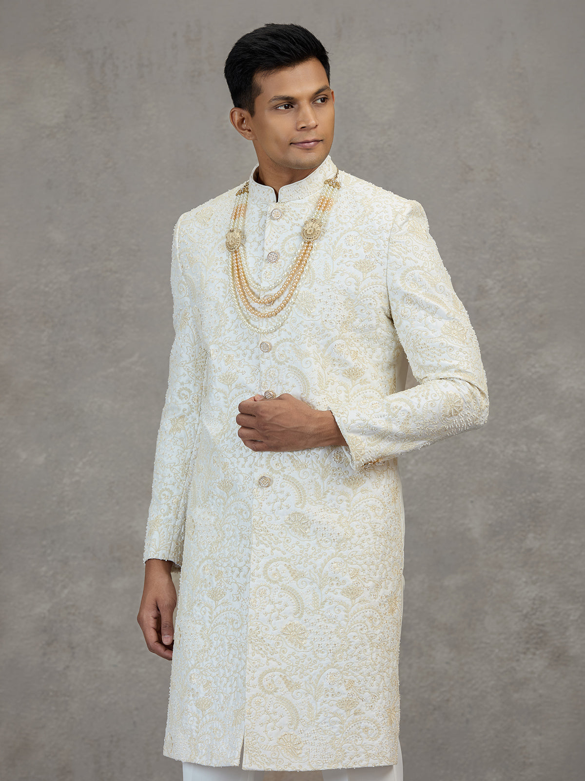 Off white satin silk sherwani with resham detailing