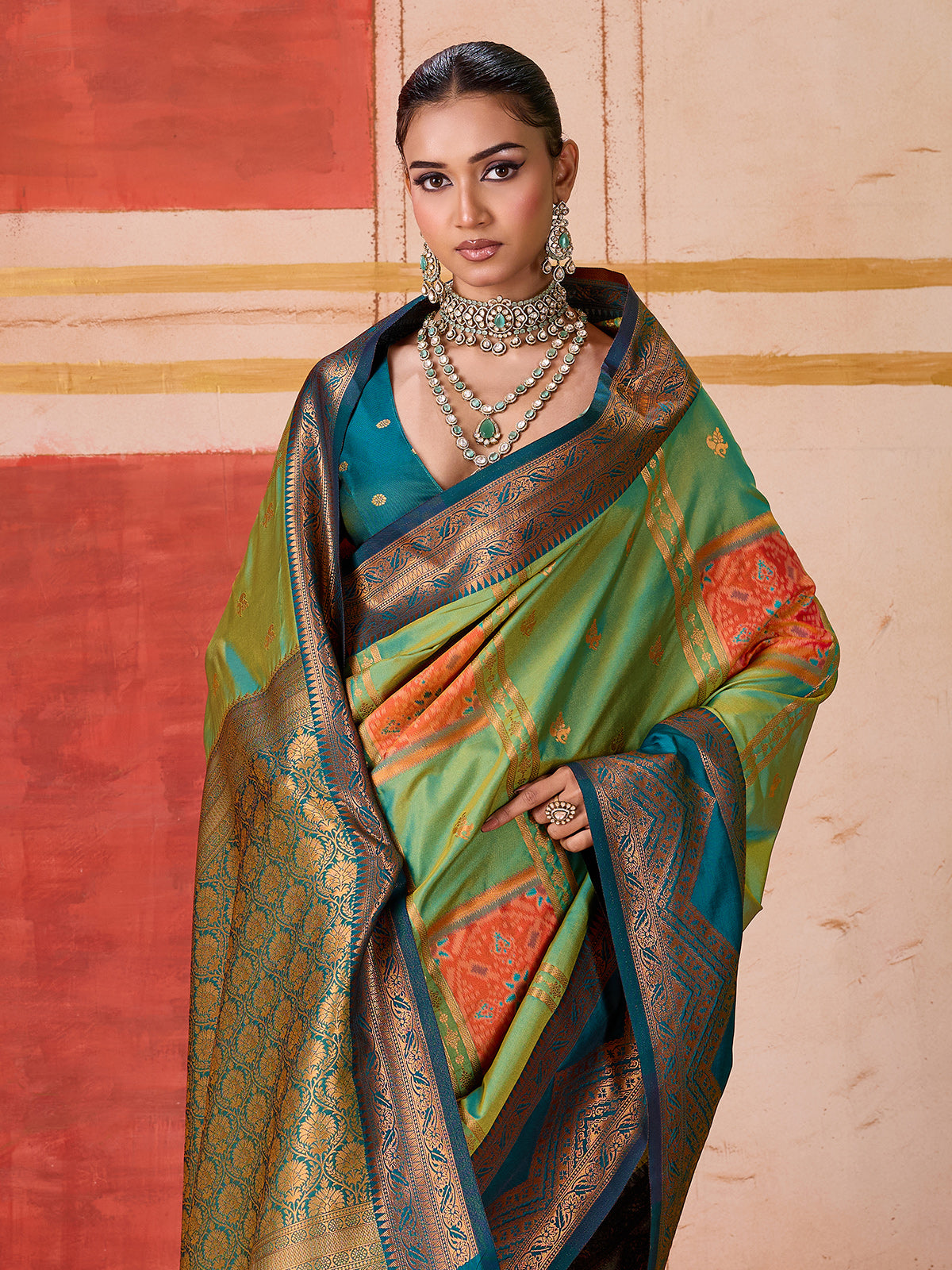 Green silk saree with highlighted contrasting border