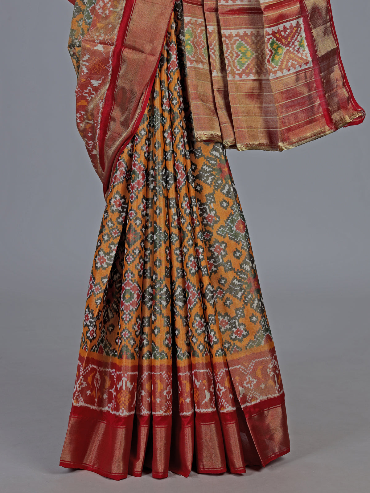 Yellow hyderabadi patola silk saree with double ikat motifs
