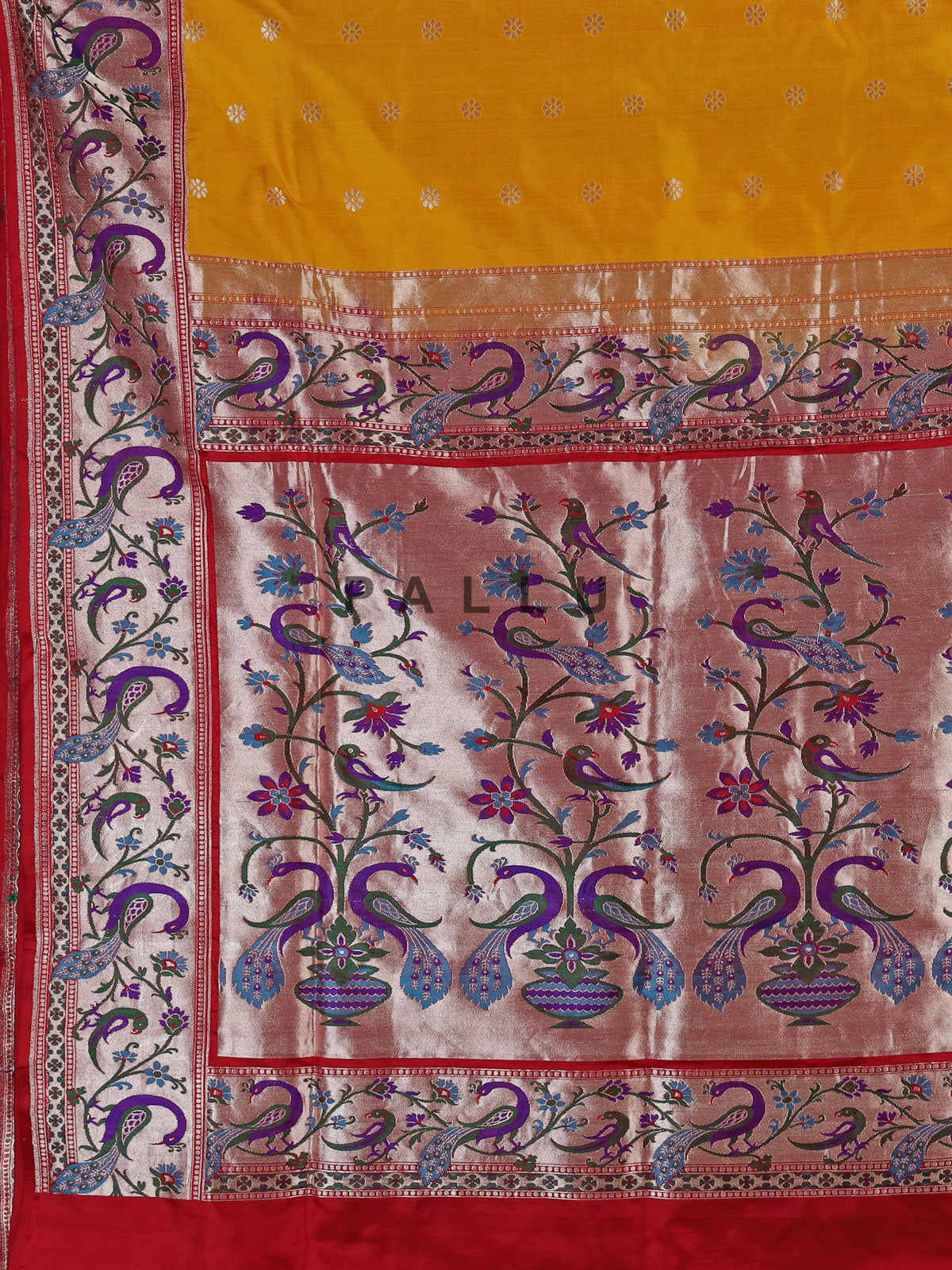 Mustard yellow banarasi silk saree with peacock zari border