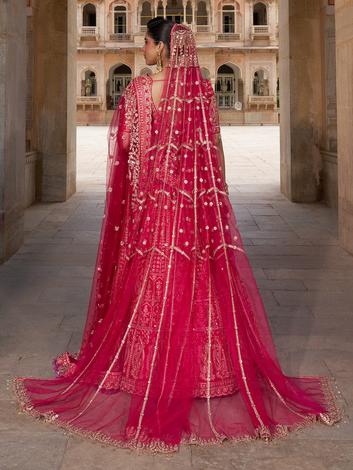 Pink silk net bridal lehenga choli with resham, cutdana and sequin work