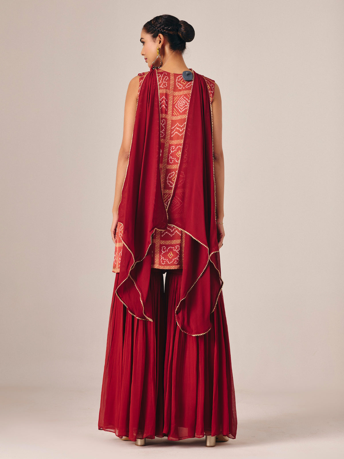 Maroon bandhej printed sharara suit with dupatta