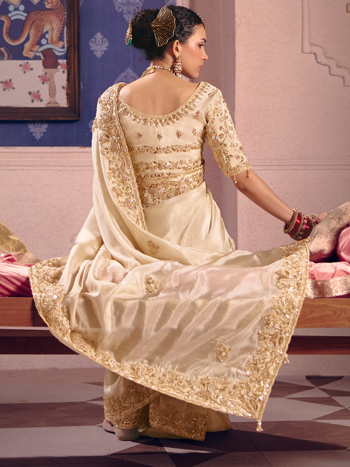 Cream viscose zari tissue saree with embellished border