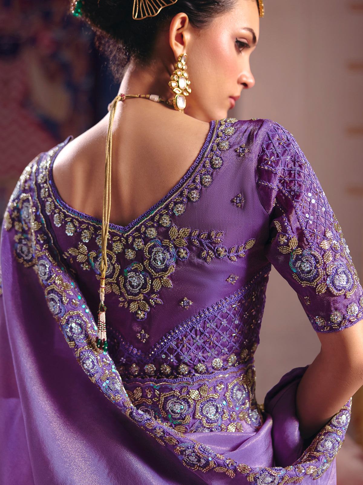 Purple viscose zari tissue saree with embellished border