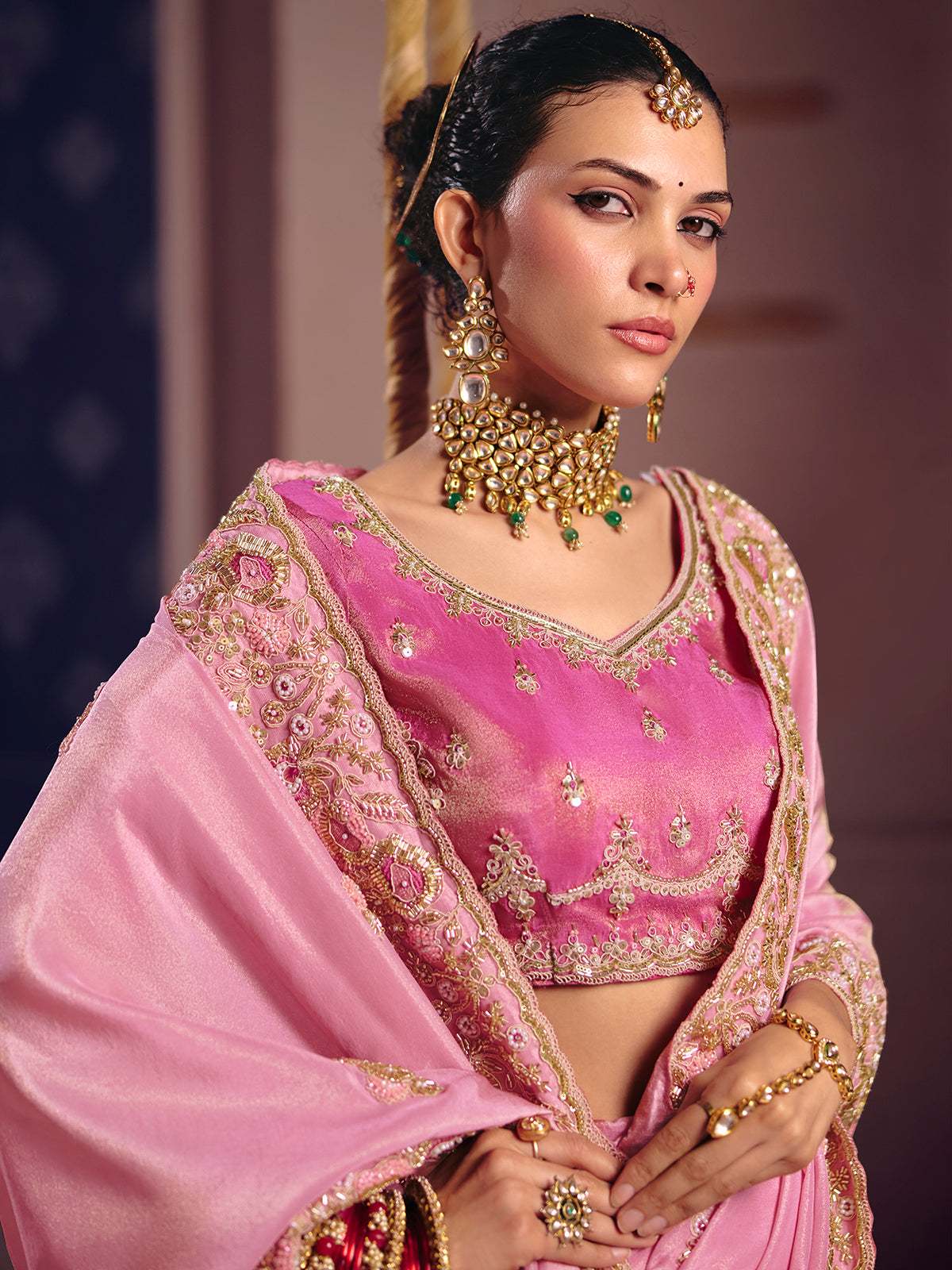 Pink viscose zari tissue saree with embellished border