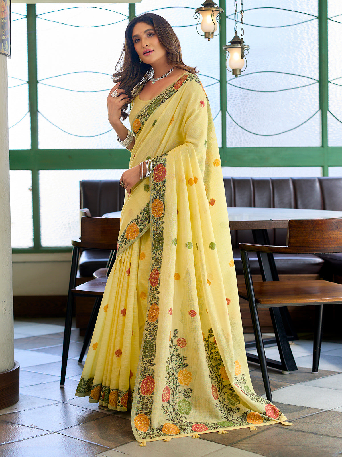 Radiant lemon yellow cotton linen saree with floral border