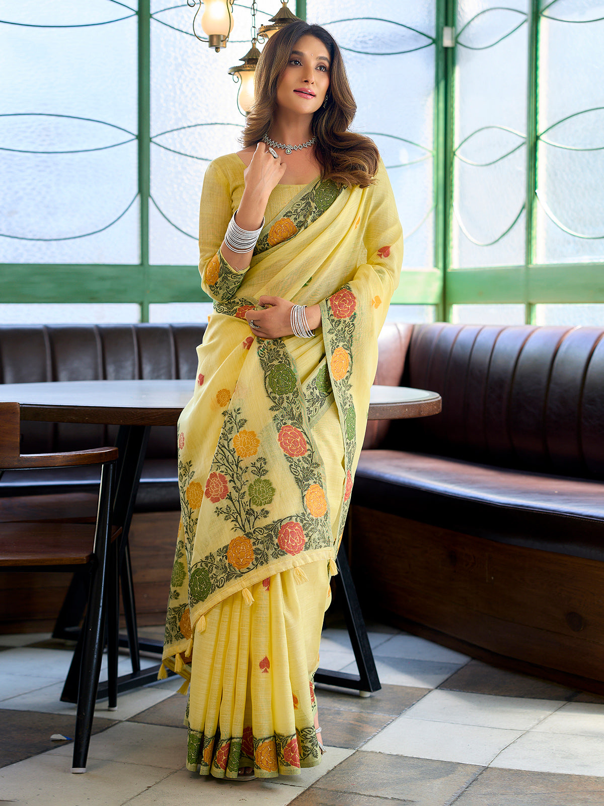Radiant lemon yellow cotton linen saree with floral border