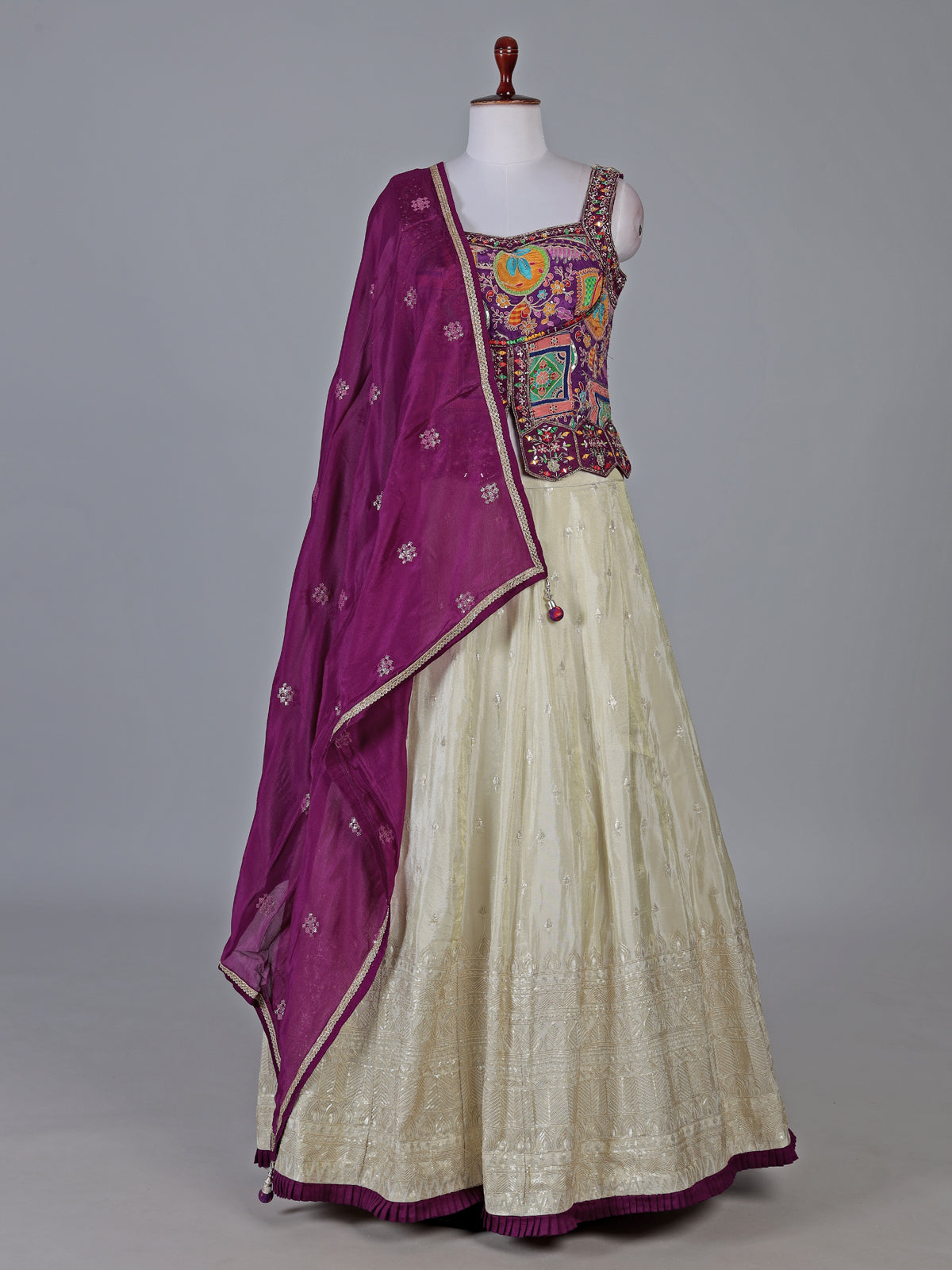 Violet and cream silk lehenga choli with zardosi work