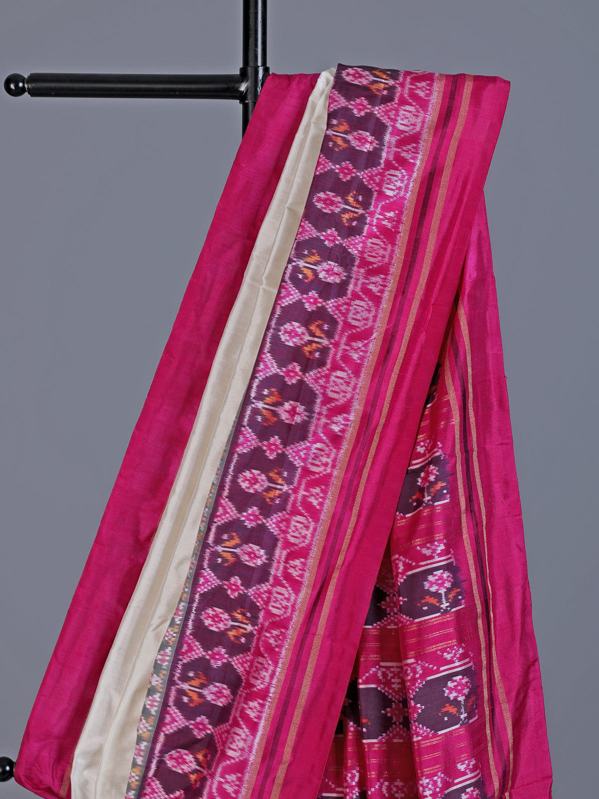 Cream pure hyderabadi patola silk saree with colorful motif border