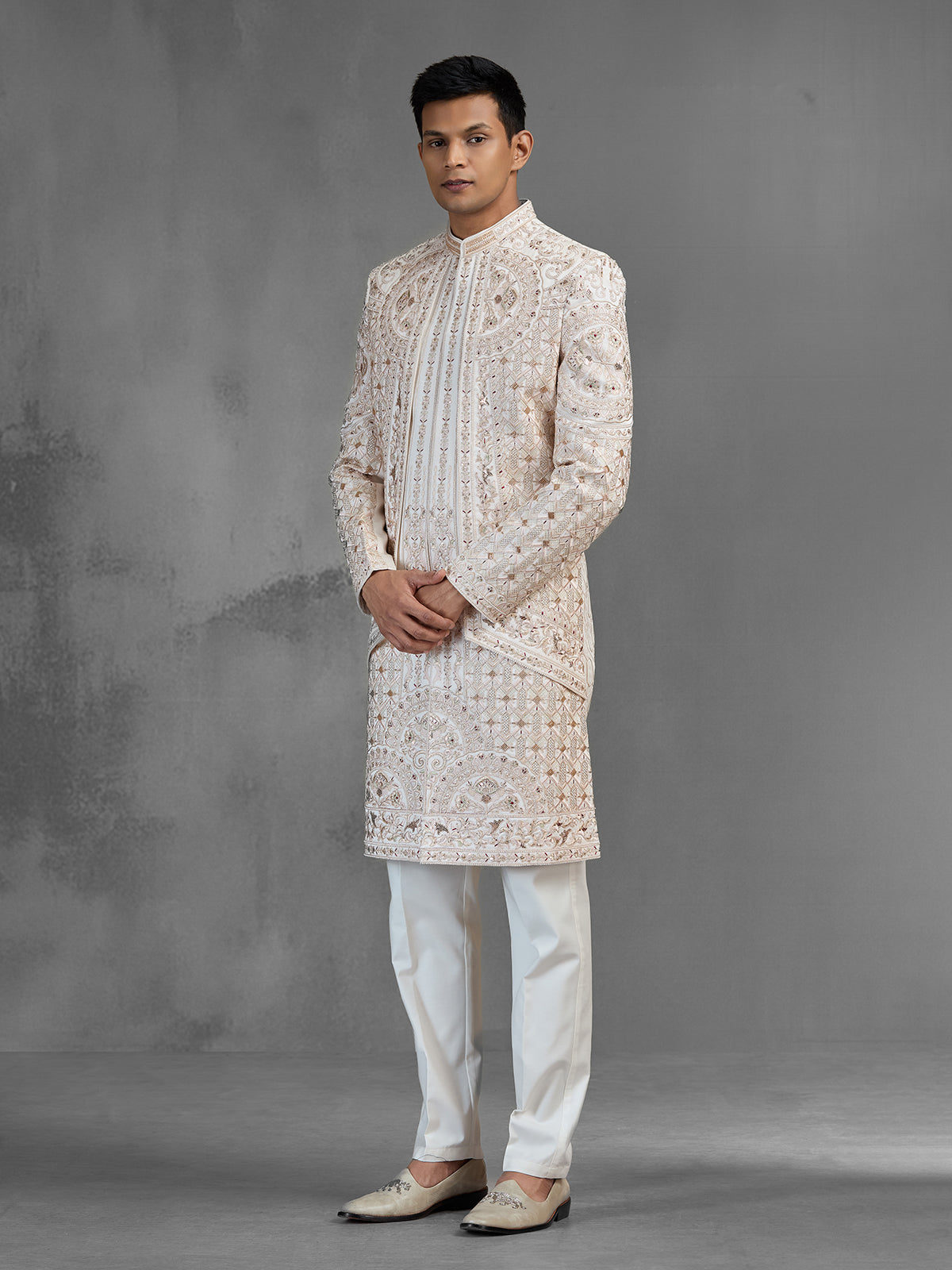 Cream silk open front sherwani with elegant detailing