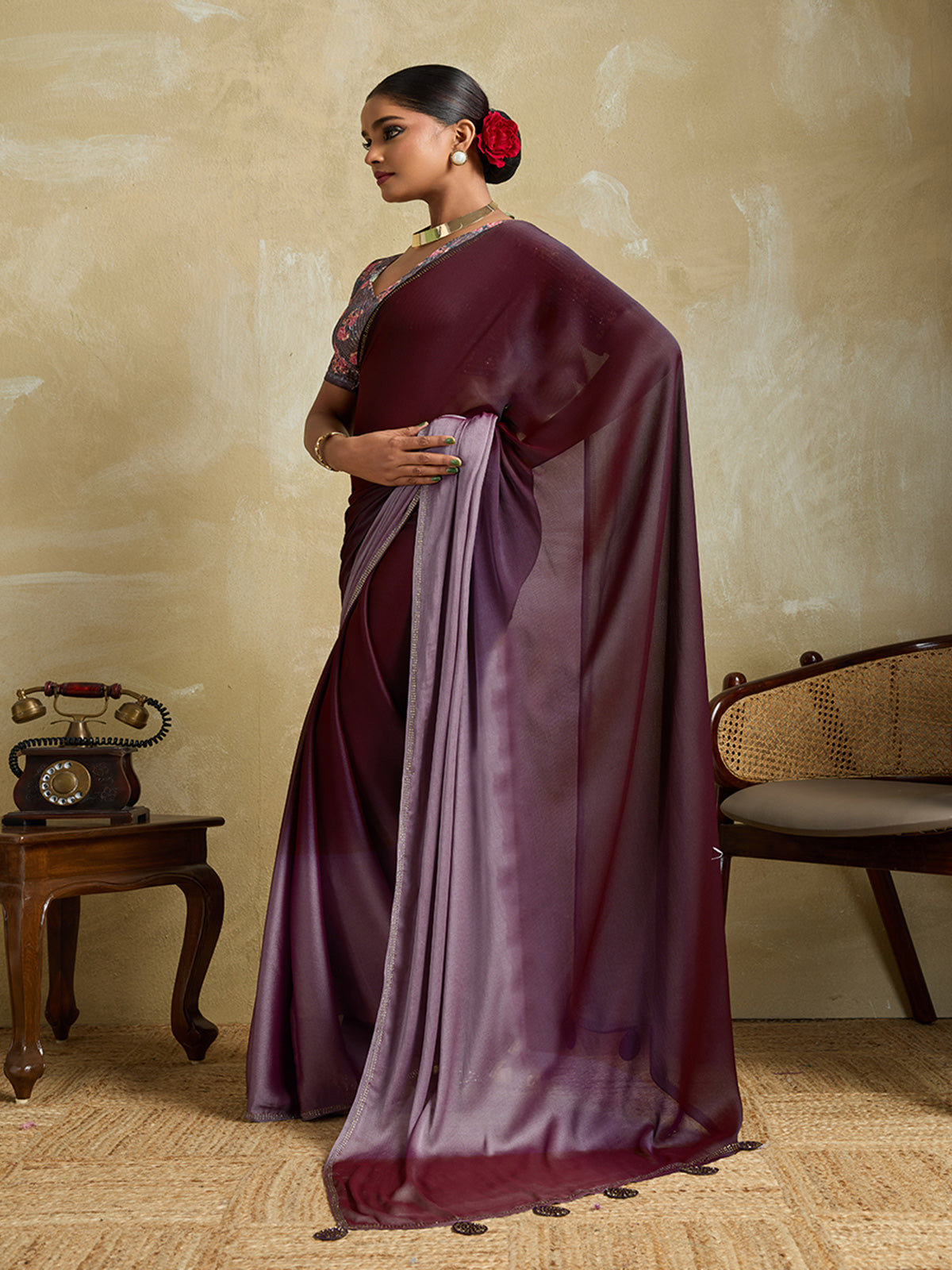Wine shaded velvet chiffon saree with stone work