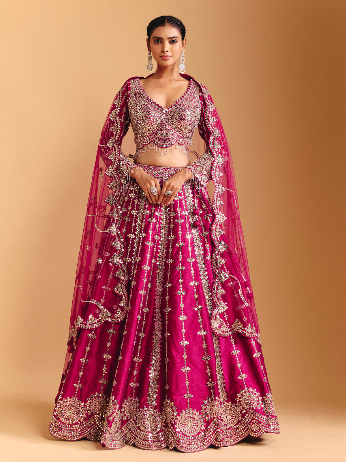 Deep rani pink raw silk lehenga choli with mirror embellishments