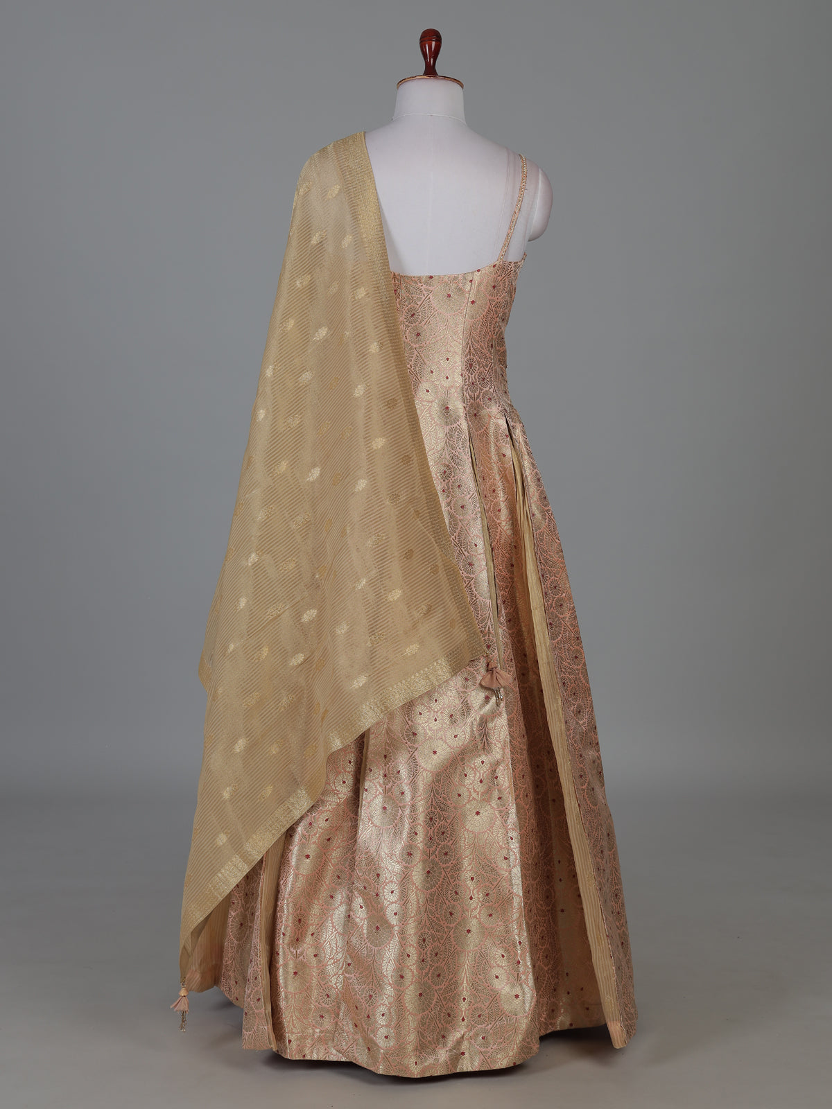 Peach brocade anarkali suit with zardosi zari elegance