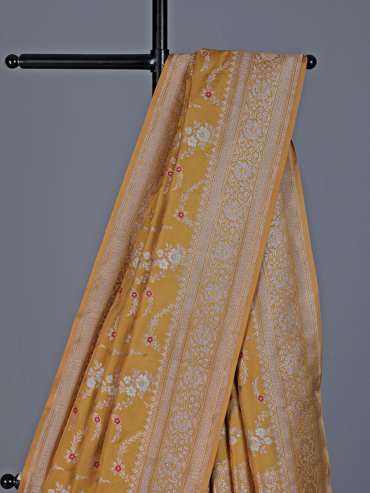 Dusty yellow banarasi silk saree with floral zari design